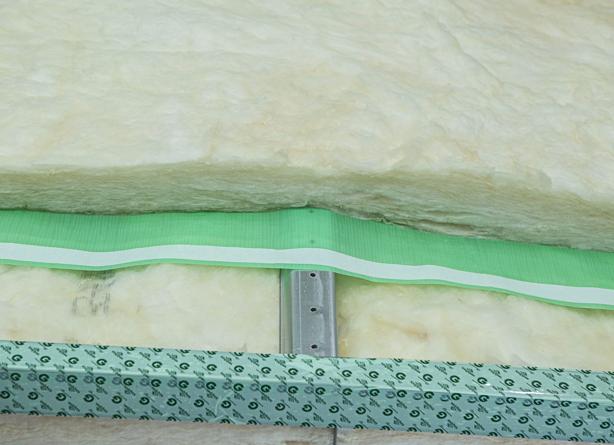 air barrier in high-r fiberglass system